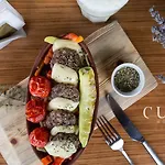 מלון Cura